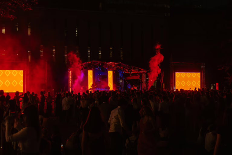 Imperial College Summer Ball 2025 main stage with video walls and dynamic lighting