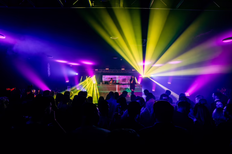 Clean Bandit performing on stage with videowall DJ booth