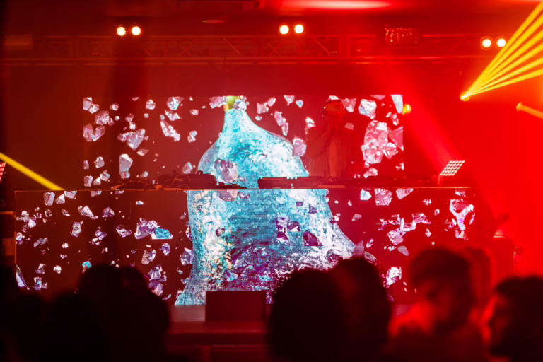 Clean Bandit performing on stage with videowall DJ booth