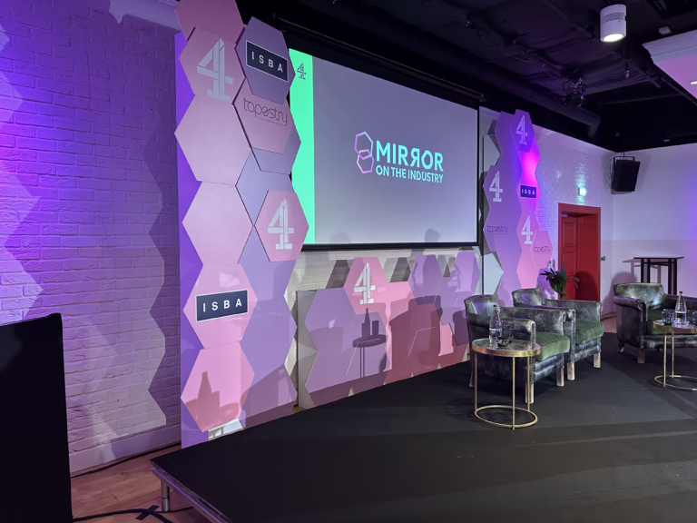 Conference + panel discussion stage with projection